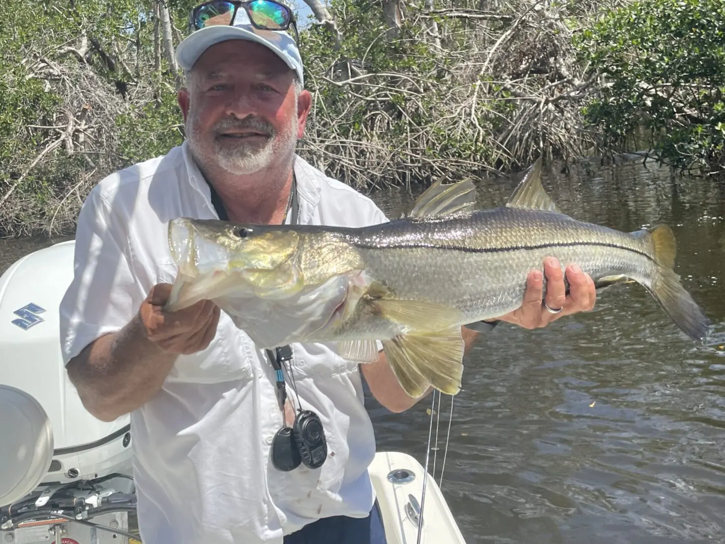 A man holding a fish