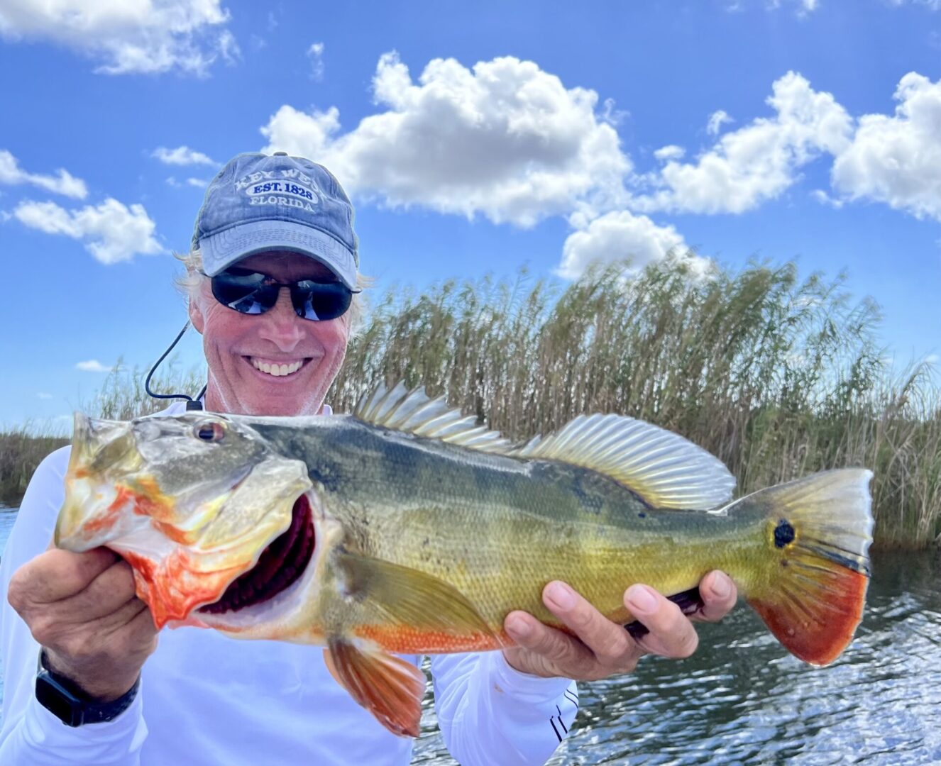 A man holding a fish.